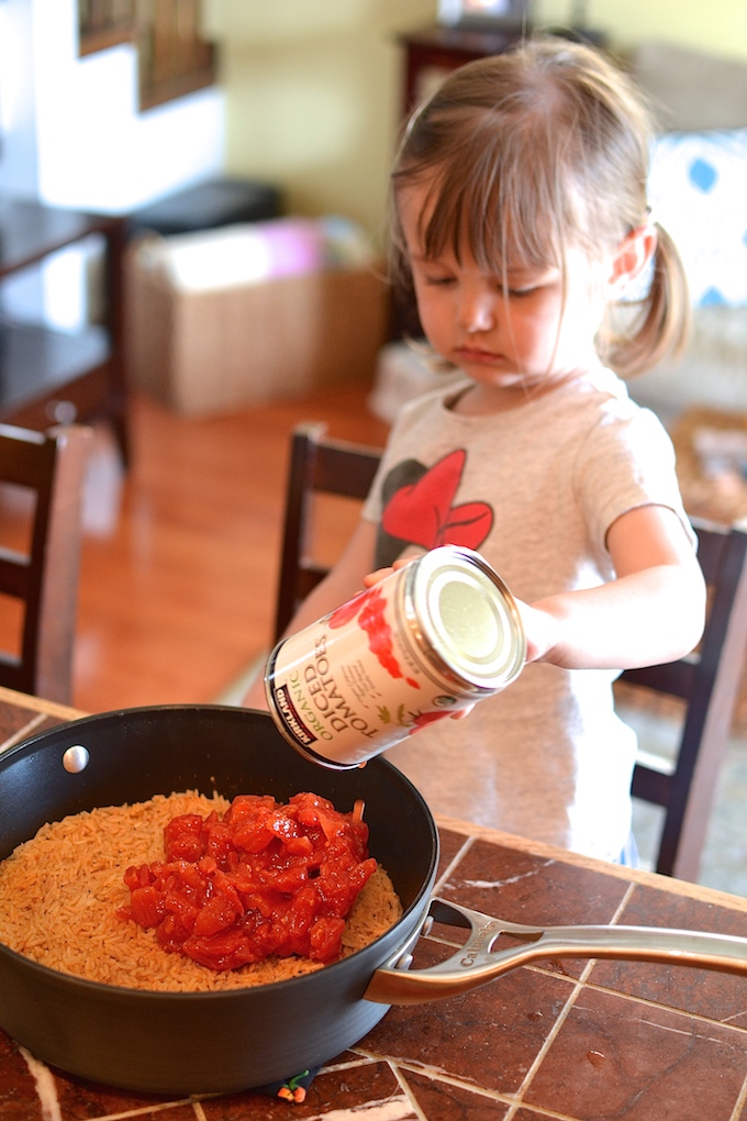 Simple Spanish Rice - Flavored with simple spices and tomatoes, this Simple Spanish Rice recipe is a perfect side dish for any dinner. ~sweetpeasandabcs.com